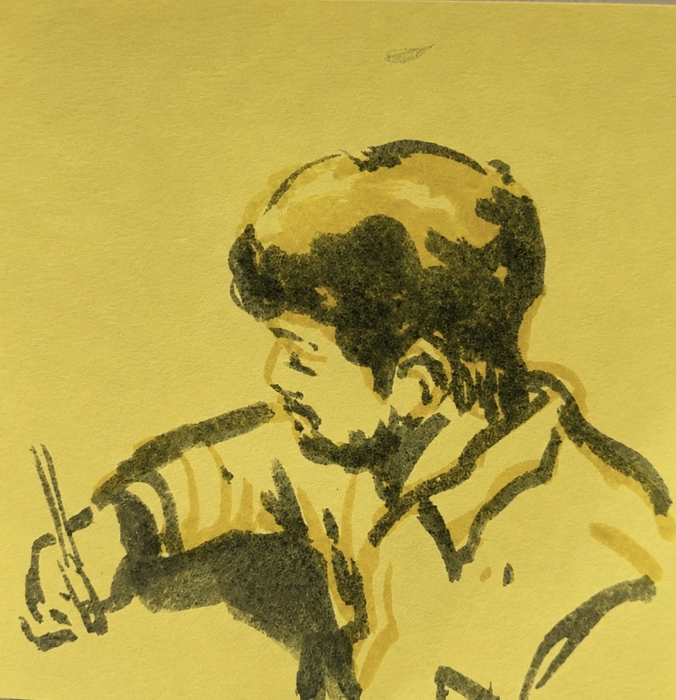 Hand-drawn sketch on a sticky note